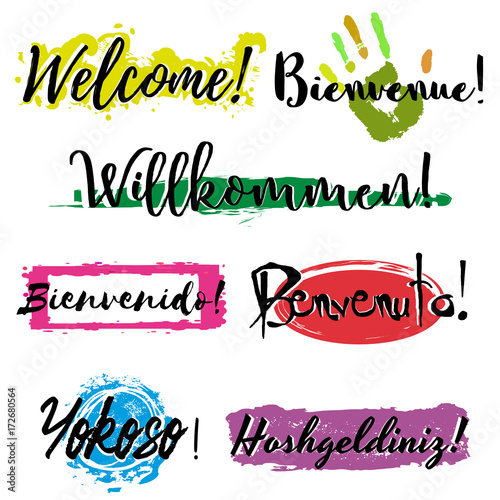 Set with lettering Welcome in different languages such as French, German, Spanish, Italian, Japanese and Turkish, with colorful splashes of paint isolated on white background. Vector illustration
