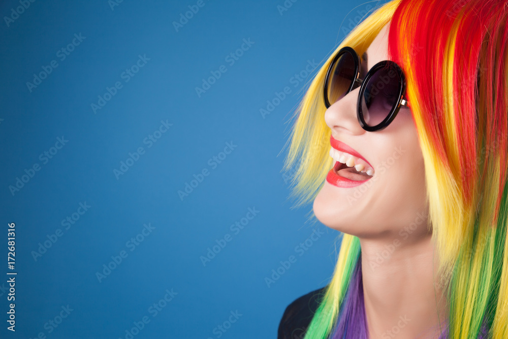 beautiful woman wearing color wig and sunglasses beautiful woman wearing color wig and sunglasses