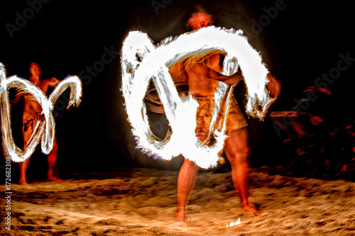 Canvas Print Fire dance Cook Islands polynesian dancer with pole of flames
