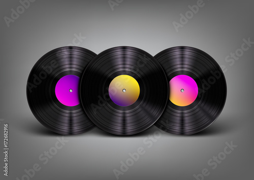 Beautiful, realistic vinyl records with vibrant multicolor labels on gray background with light effect and shadow. Vector illustration. Music, disco, retro background