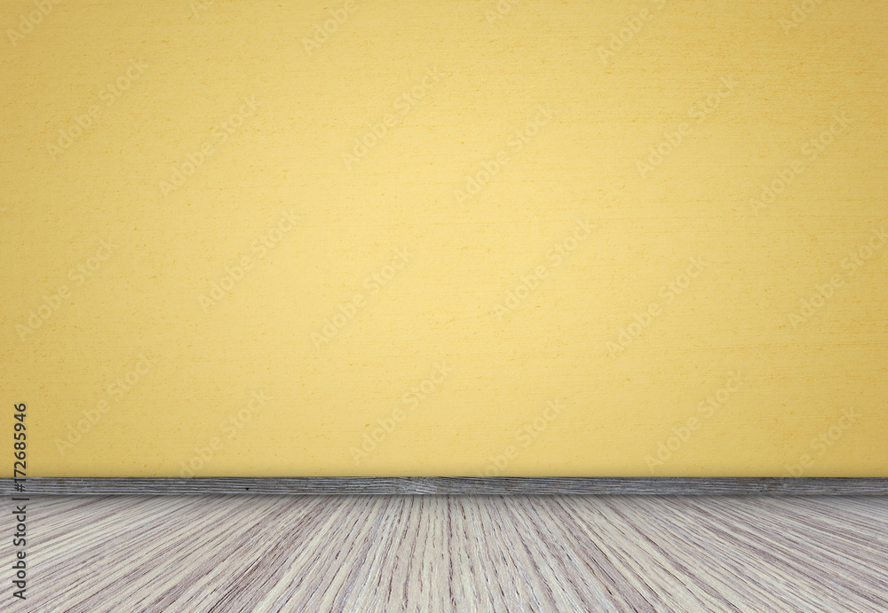 Pine floor and light yellow wall, interior of an empty living room Pine floor and light yellow wall, interior of an empty living room