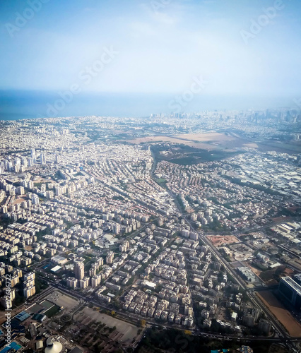 View of Tel Aviv and the Mediterranean Sea from the window of the plane taking off from the airport Ben Gurion