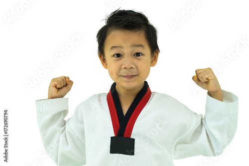 Asian boy wearing white Taekwondo suit acting ready to battle, Isolated on white background. photo