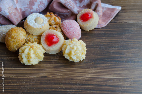  Panellets, typical sweets consumed at All Saints Day (Dia Todos Los Santos)  in Catalonia, Spain. Catalan small cakes or cookies background woth copyspace. photo