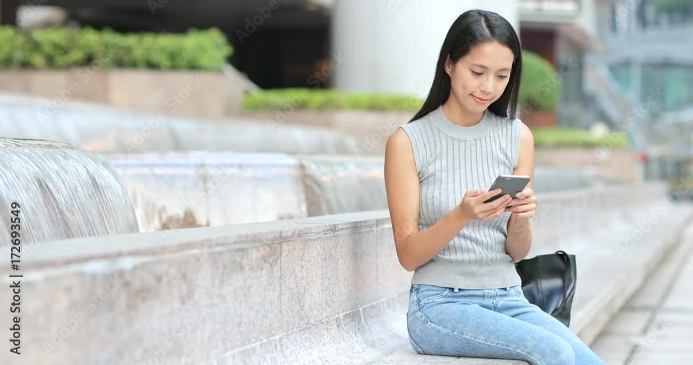 Woman using cellphone Woman using cellphone