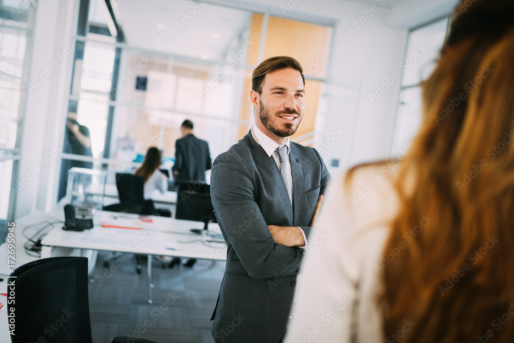 Fototapeta premium Portrait of architects having discussion in office