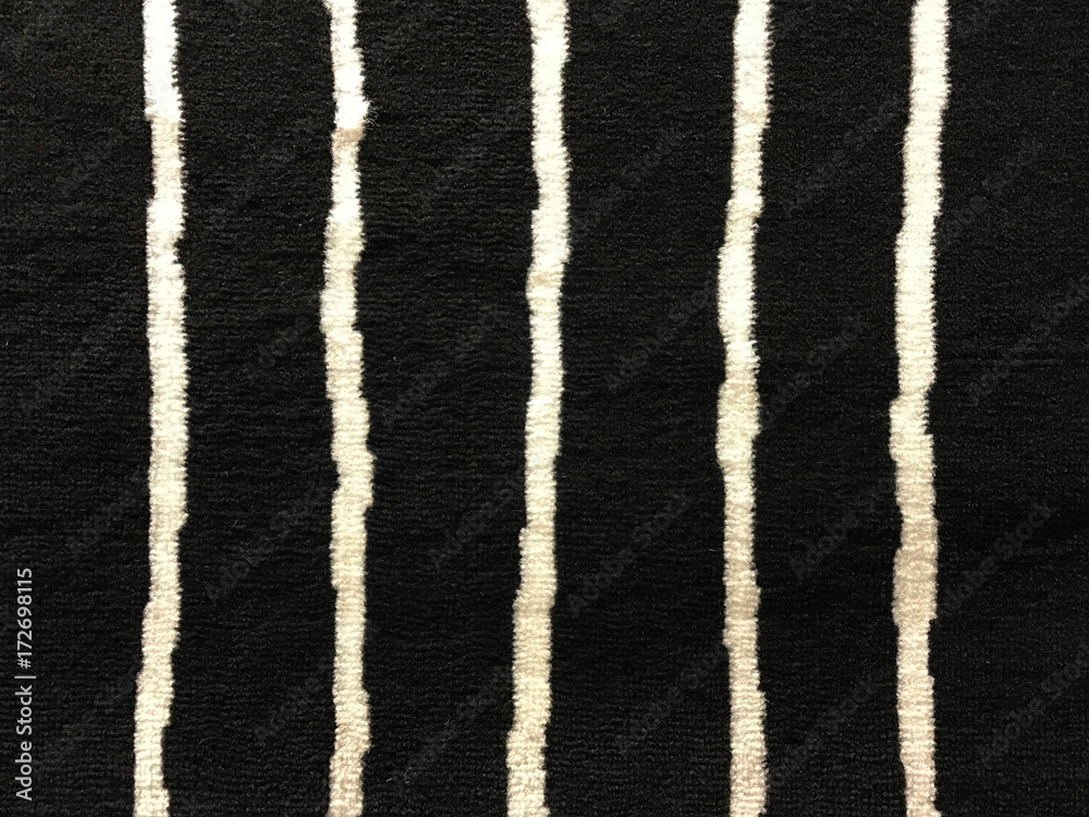 Texture of black carpet with white stripe Texture of black carpet with white stripe