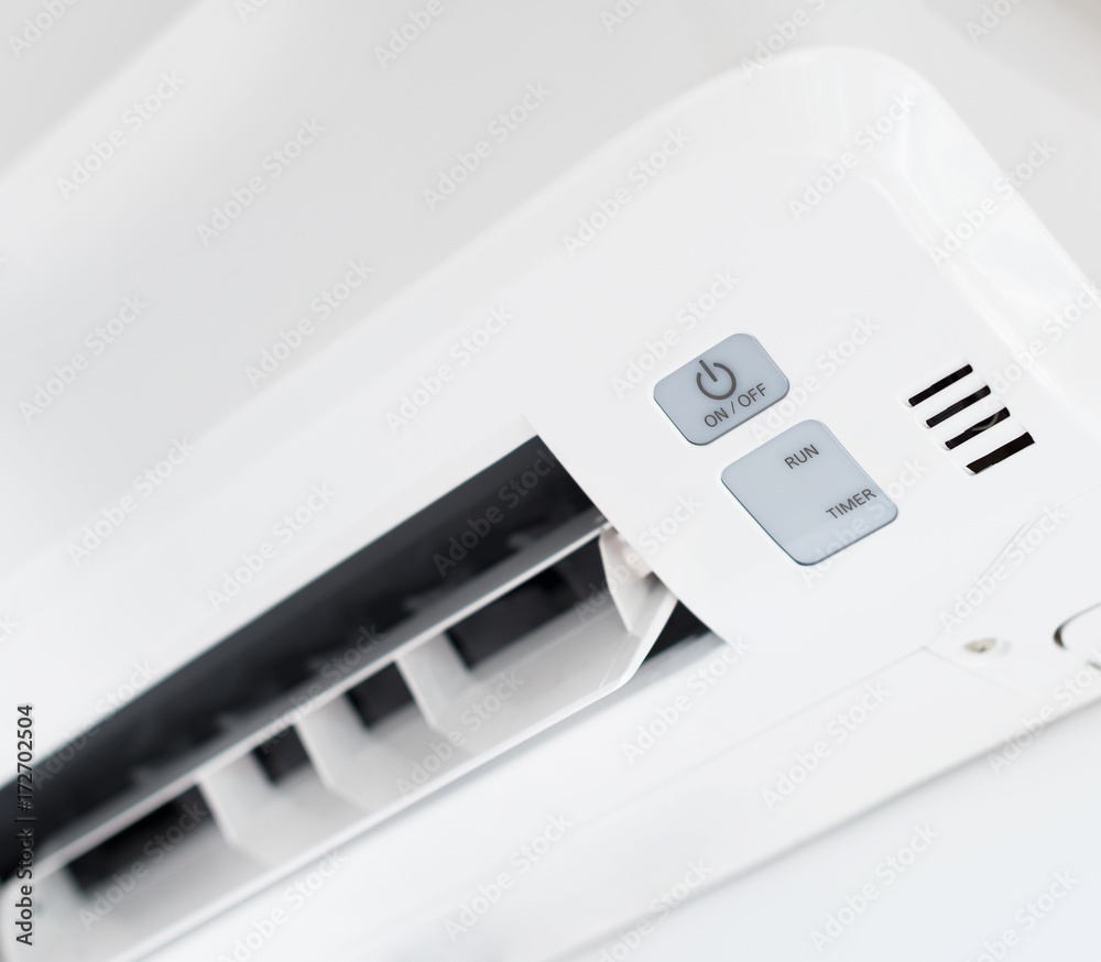 Air conditioner inverter mounted on the wall.