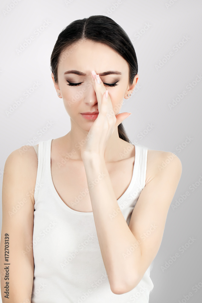 Health And Pain. Stressed Exhausted Young Woman Having Strong Tension Headache. Closeup Portrait Of Beautiful Sick Girl Suffering From Head Migraine, Feeling Pressure And Stress. High Resolution Image Health And Pain. Stressed Exhausted Young Woman Having Strong Tension Headache. Closeup Portrait Of Beautiful Sick Girl Suffering From Head Migraine, Feeling Pressure And Stress. High Resolution Image