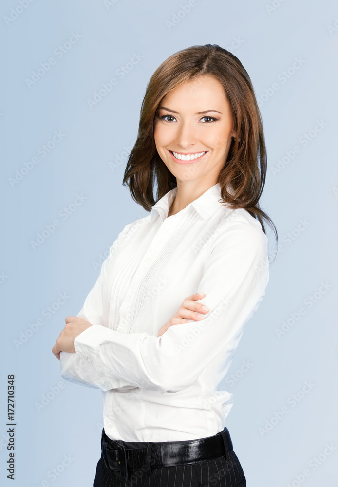 Smiling businesswoman, over blue Smiling businesswoman, over blue