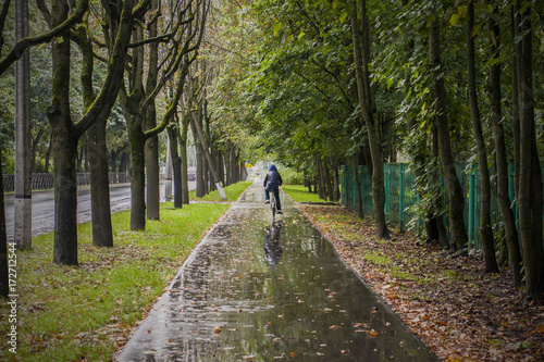 Bicycle hike in rainy autumn weather