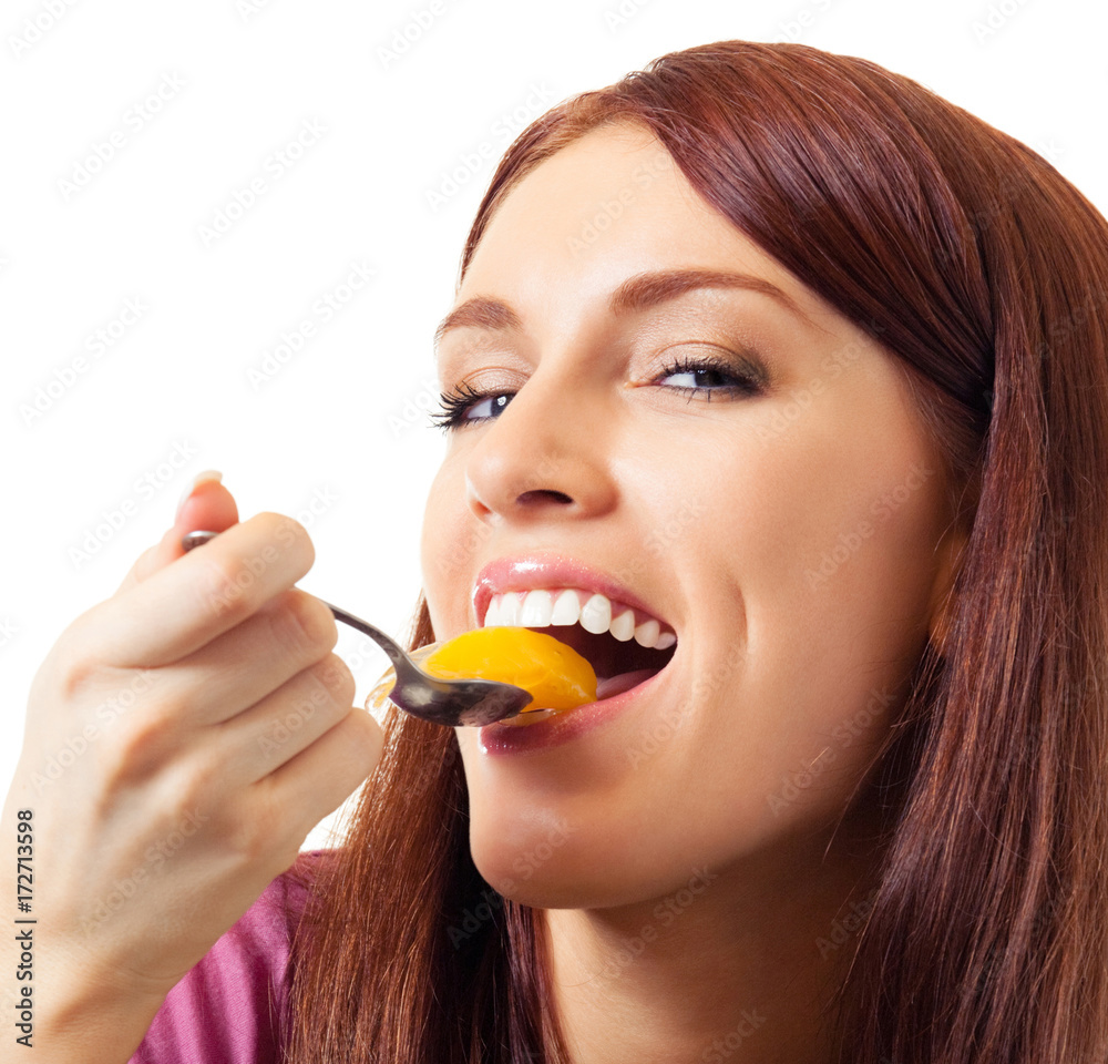 Cheerful beautiful woman eating apricots Cheerful beautiful woman eating apricots