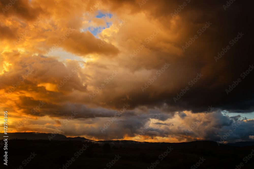 Dark storm clouds before rain at sunset. cloud on sunse