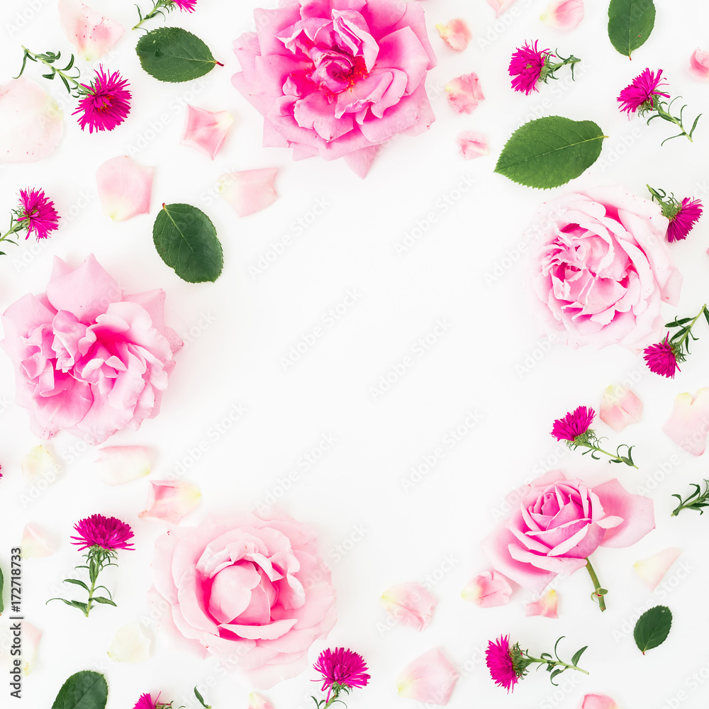 Floral round frame with pink flowers and leaves on white background. Flat lay, top view. Frame background