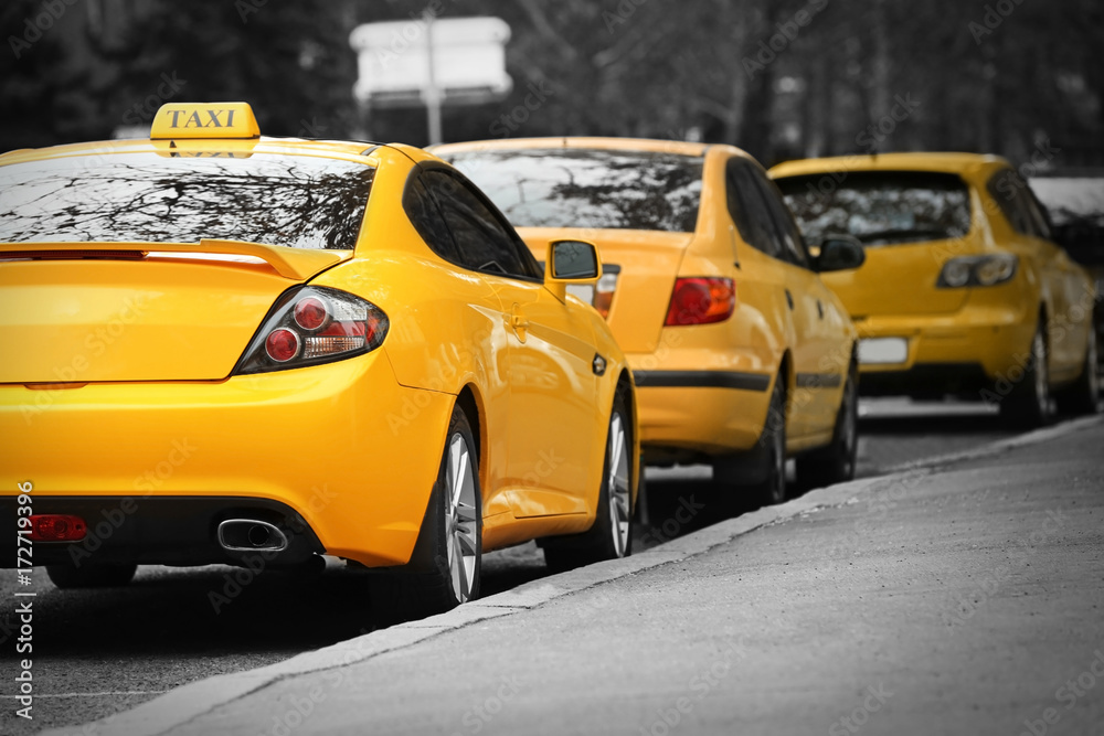 Closeup of yellow taxi cab in traffic jam Closeup of yellow taxi cab in traffic jam