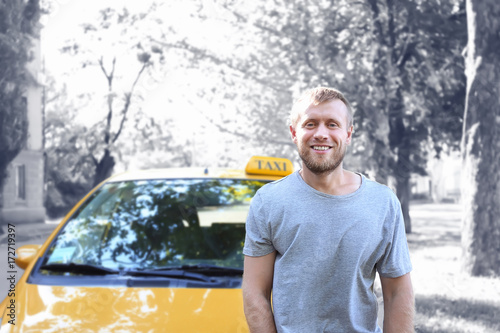 Handsome taxi driver near c...
