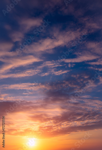 Romantic beautiful sunset in the sky and clouds. © Sviatoslav Khomiakov