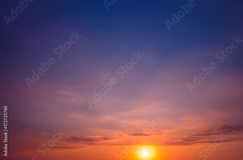 An unusual sunset against a blue-violet sky.