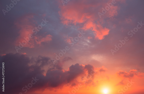 Storm clouds against the background of a blood-red sunset.