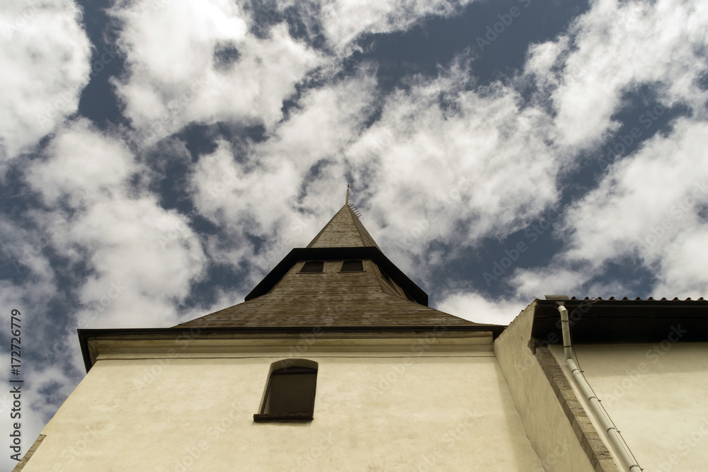 Church tower and a cloud sky