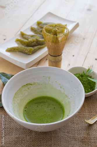 Set of matcha powder bowl, wooden spoon and whisk, green tea leaf, Organic Green Matcha Tea ceremony
