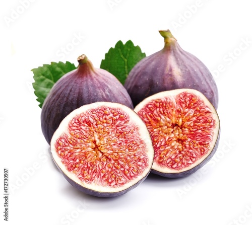Fresh figs with leaves .