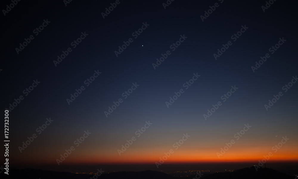 Sunset sky - deep blue and orange background Sunset sky - deep blue and orange background