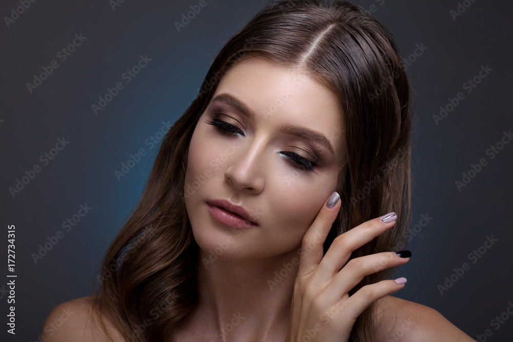 Portrait of a beautiful woman with creative make-up and hair. Portrait of a beautiful woman with creative make-up and hair.