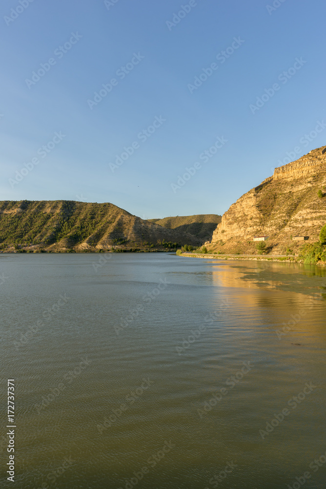 The river Ebro on its way through Mequinenza, Aragon The river Ebro on its way through Mequinenza, Aragon