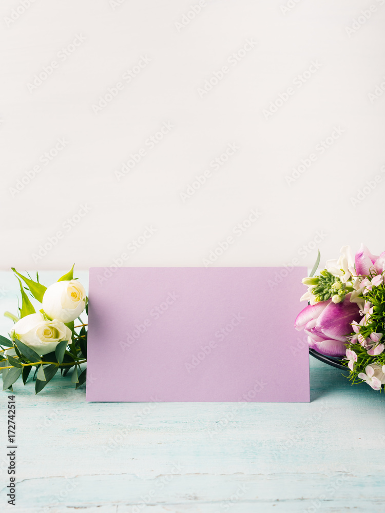 Empty purple card flowers tulips roses spring pastel color background. Easter holiday, wedding birthday invitation Empty purple card flowers tulips roses spring pastel color background. Easter holiday, wedding birthday invitation