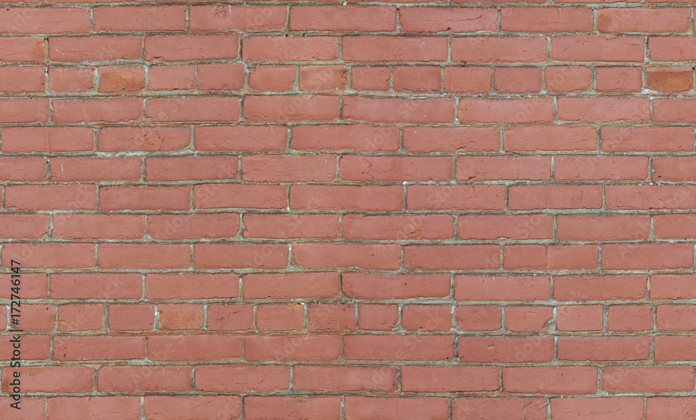 Obraz premium Red brick wall background texture seamlessly tileable