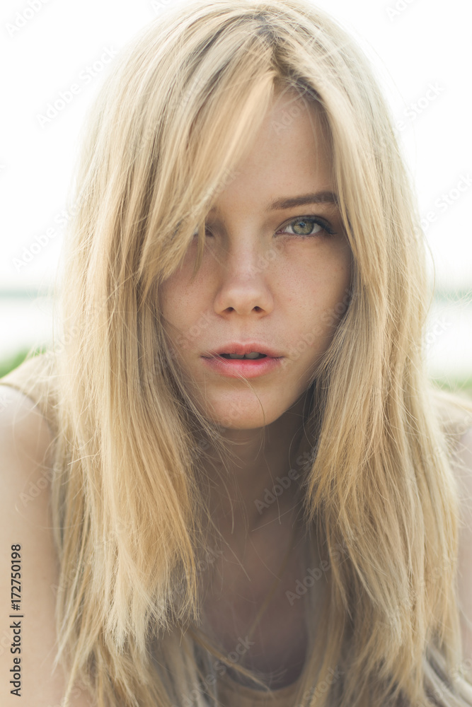 portrait of a beautiful young blonde girl closeup portrait of a beautiful young blonde girl closeup