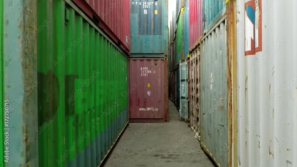 JAKARTA, Indonesia. September 19, 2017: Stacks of containers in Sunda Kelapa Old Harbor JAKARTA, Indonesia. September 19, 2017: Stacks of containers in Sunda Kelapa Old Harbor