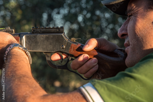 Hunter with a rifle in the countryside, Spain