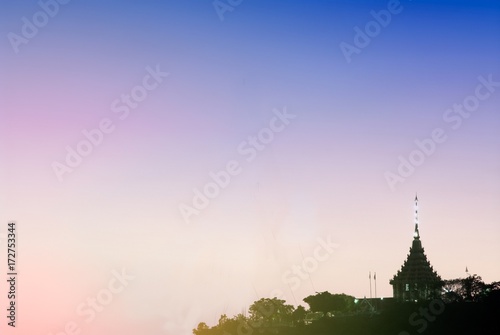 Sunset of Pagoda in Thai temple .
