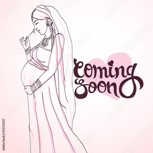 indian pregnant woman in pregnancy dress is prepared for maternity