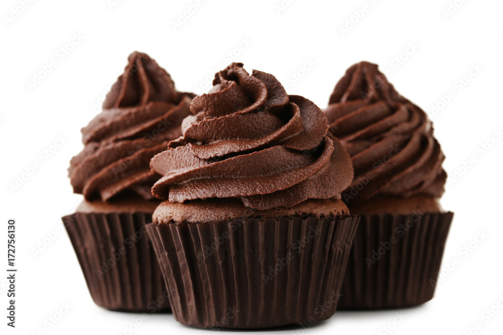 Chocolate cupcakes isolated on white background Chocolate cupcakes isolated on white background