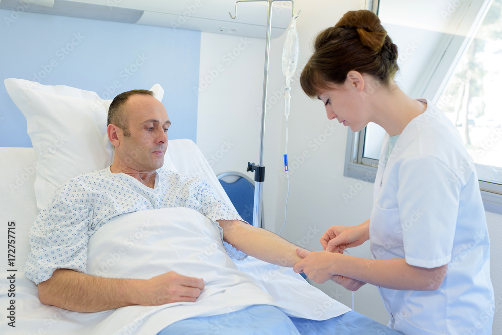 Fototapeta premium nurse looking after patient