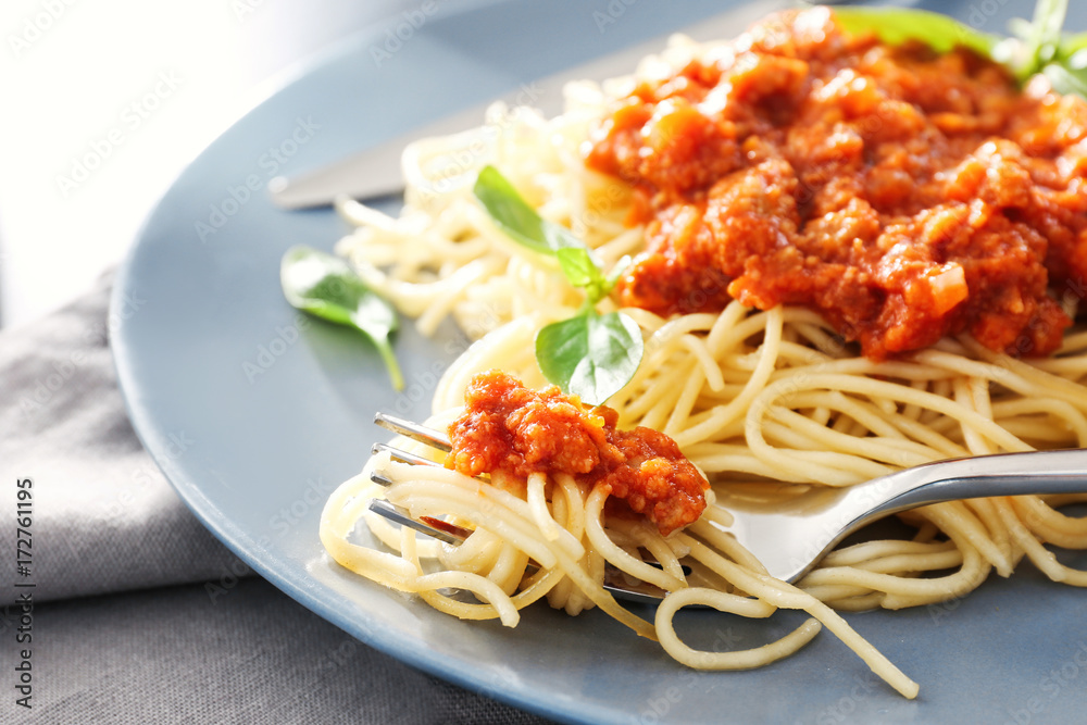 Delicious pasta with bolognese sauce on plate, closeup Delicious pasta with bolognese sauce on plate, closeup