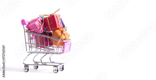 isolated trolley filled with gift package