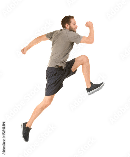 Young man in sportswear run...