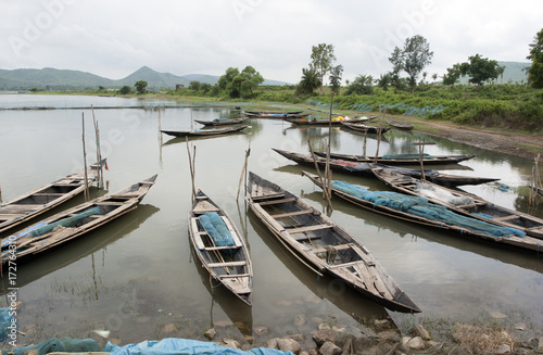 Fishing boats at the bank of Chilika Lake photo