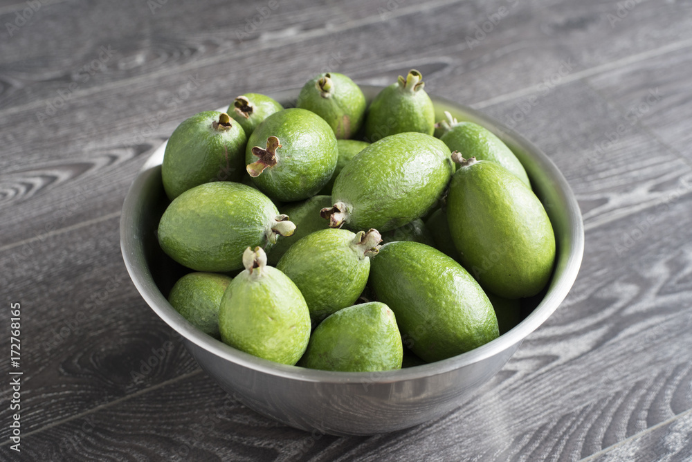 Feijoa fruit in stainless steel bowl, New Zealand. Feijoa fruit in stainless steel bowl, New Zealand.