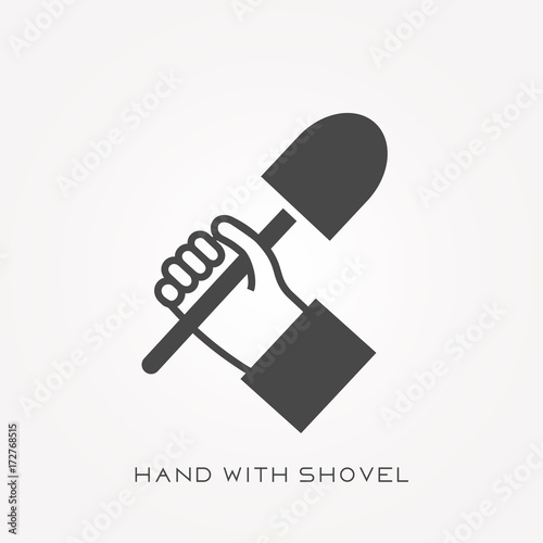 Silhouette icon hand with shovel