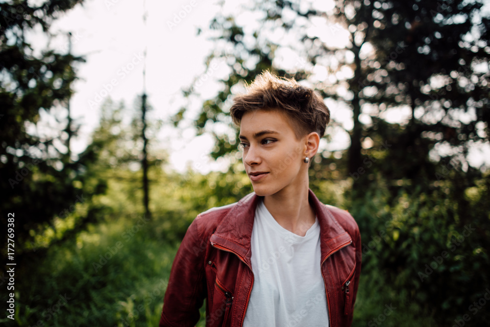 Portrait of beautiful shorthair woman in the nature Portrait of beautiful shorthair woman in the nature