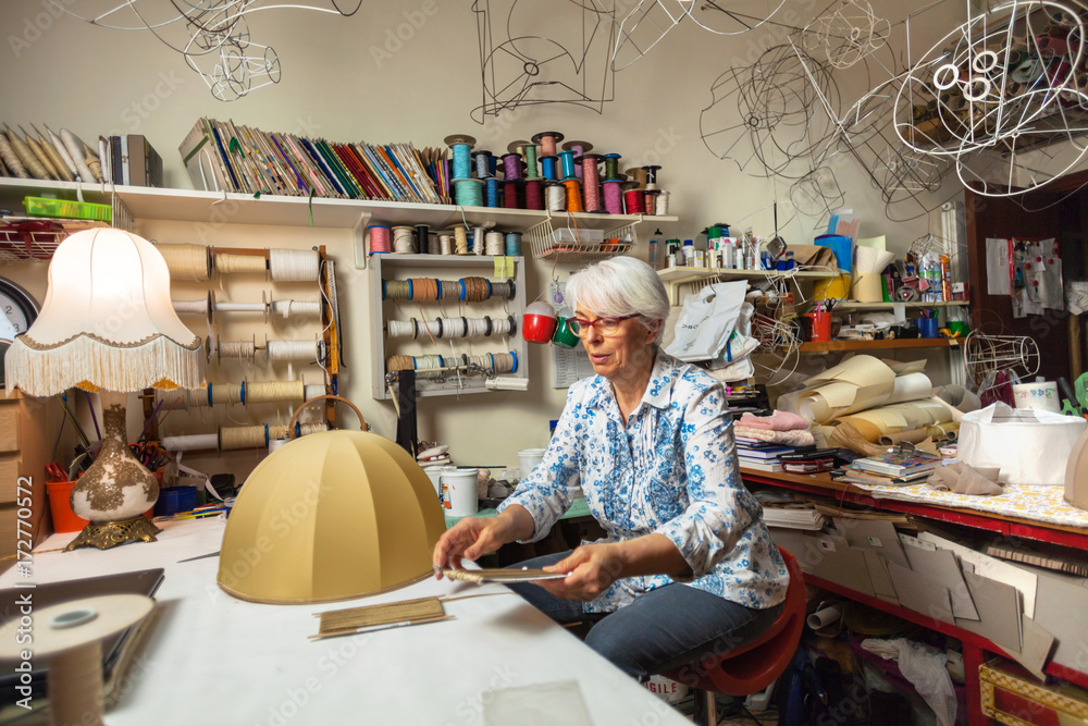 Italian Artisan at Work in her Workshop Italian Artisan at Work in her Workshop