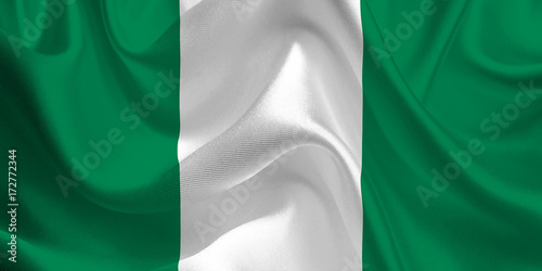 Waving flag of the Nigeria. Nigerian Flag in the Wind. Nigerian National mark. Waving Nigeria Flag. Nigeria Flag Flowing. photo