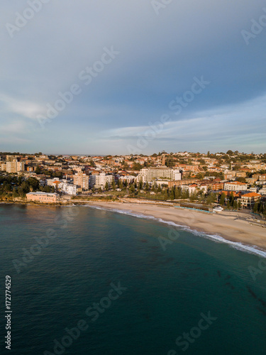 Aerial view of Coogee Beach with cloudy sky.