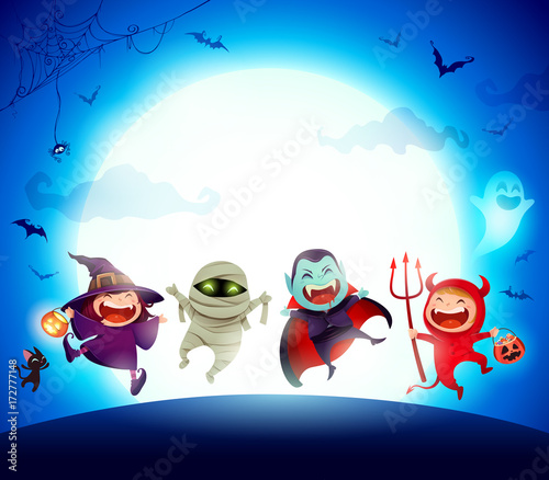 Halloween Kids Costume Party. Group of kids in Halloween costume jumping in the moonlight.