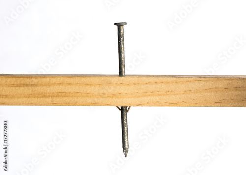 Galvanied Nail Through Wood
